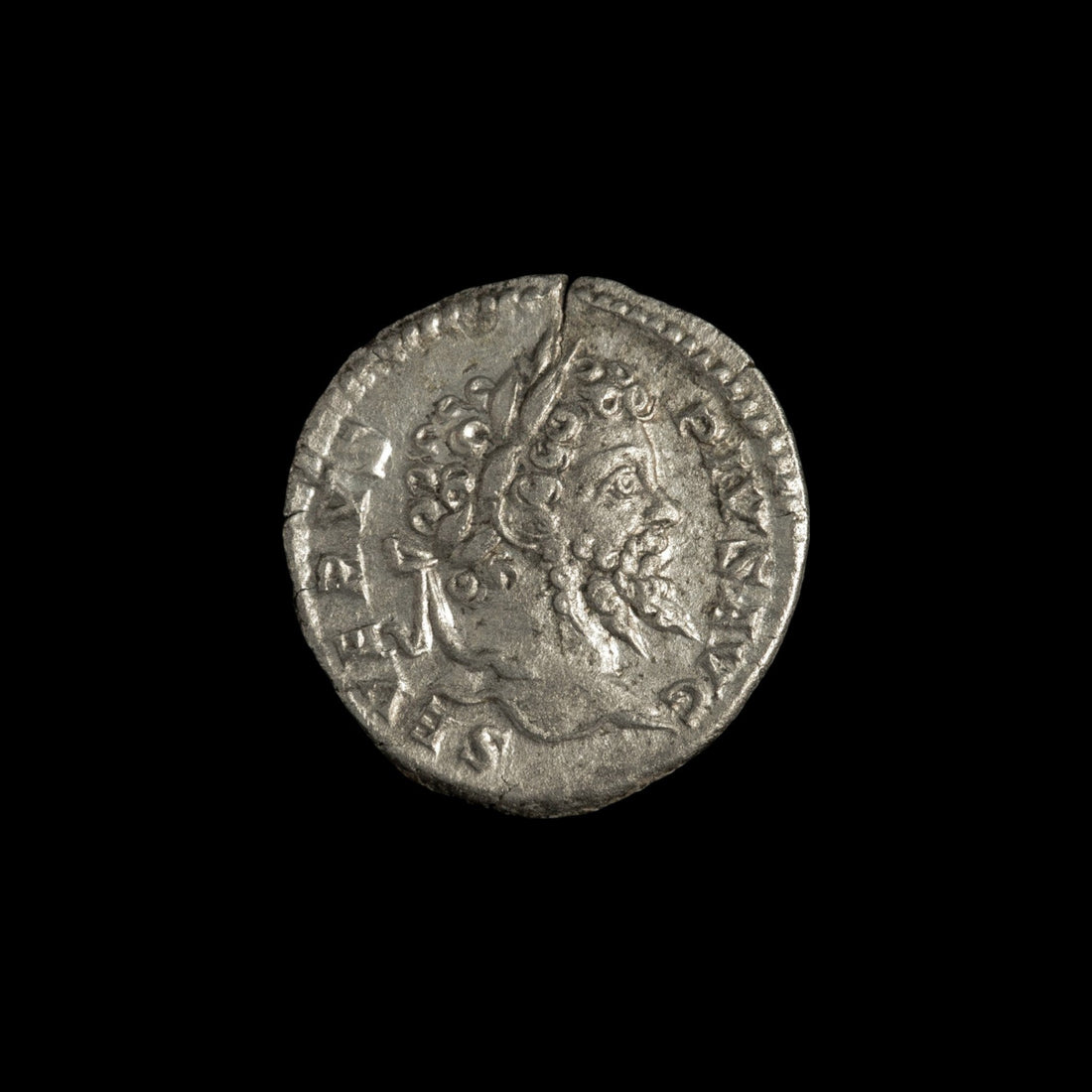 Roman silver denarius of Septimius Severus, showing typical authentication markers: irregular flan, natural toning, and well-struck portrait.