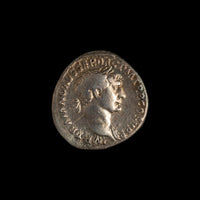 Obverse of Roman silver denarius of Trajan, legend IMP TRAIANO AVG GER DAC P M TR P COS V P P, radiate or laureate bust right.