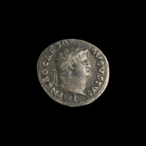 Obverse of Roman silver denarius of Nero, legend IMP NERO CAESAR AVGVSTVS, radiate or laureate bust right.