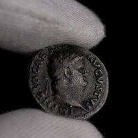 Macro detail of Roman silver denarius of Nero, portrait close-up.