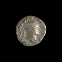 Obverse of Roman silver denarius of Vespasian, legend IMP CAES VESP AVG P M, radiate or laureate bust right.
