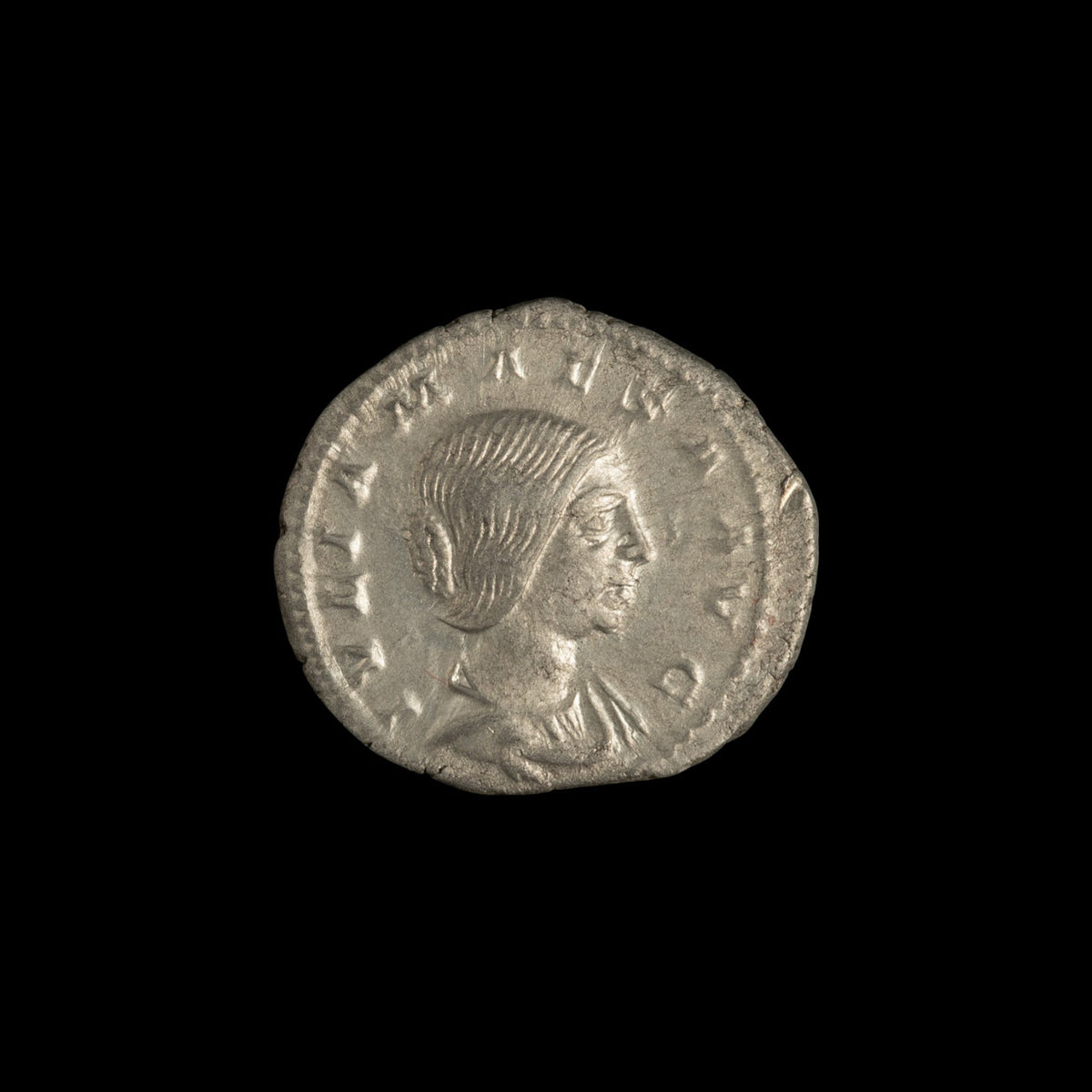 Obverse of Roman silver denarius of Julia Maesa, legend IVLIA MAESA AVG, radiate or laureate bust right.