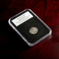 Roman silver denarius of Julia Mamaea in protective slab with catalog label.
