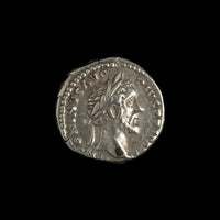 Obverse of Roman silver denarius of Antoninus Pius, legend ANTONINVS AVG PIVS P P IMP II, radiate or laureate bust right.
