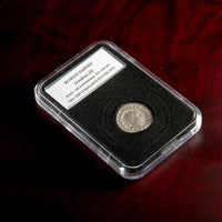 Roman silver antoninianus of Gordian III in protective slab with catalog label.