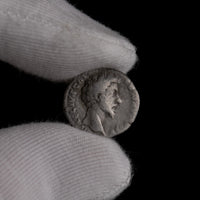 Macro detail of Roman silver denarius of Marcus Aurelius (Caesar), portrait close-up.