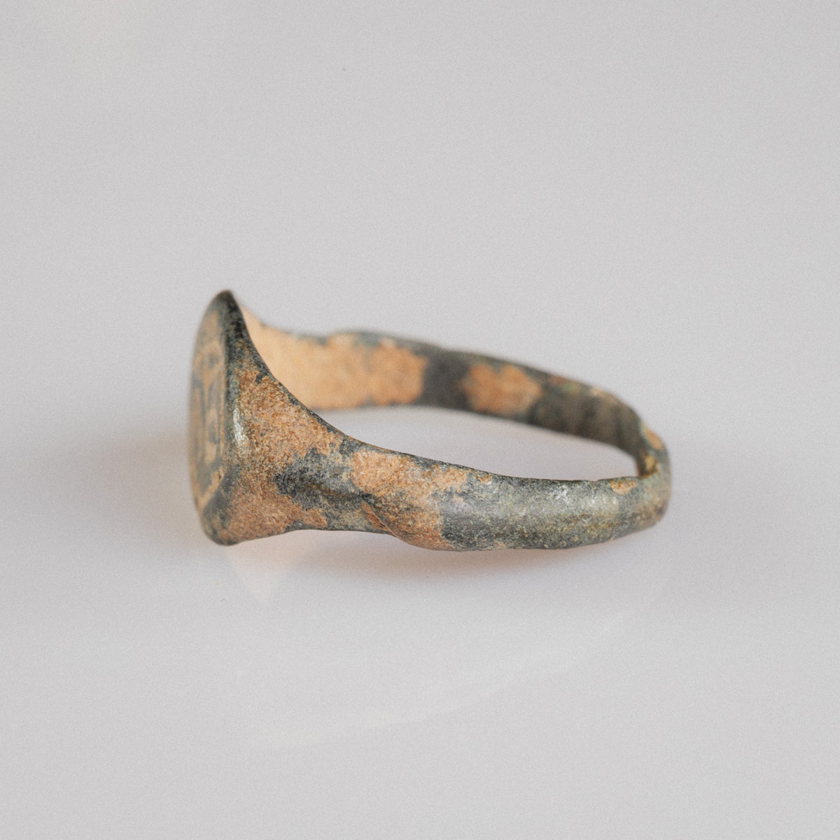 Medieval bronze signet ring Aldren, opposite side view showing green-black tenorite corrosion