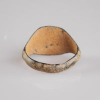 Medieval bronze signet ring Falco, rear view of thin hoop with cuprite interior tones