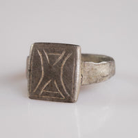Close-up bezel detail of Byzantine silver ring Theofanis showing geometric hourglass engraving