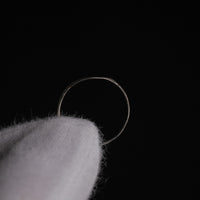 Top-down view of Medieval silver ring Aldwin showing thin sheet-metal hoop construction