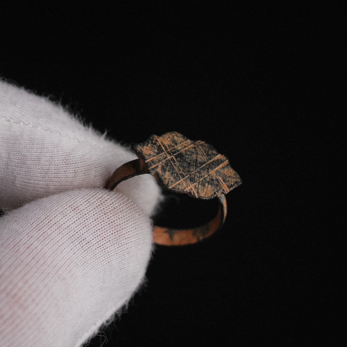 Medieval bronze ring Vladica through-ring view showing hoop interior and bezel profile