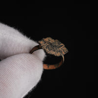 Medieval bronze ring Vladica through-ring view showing hoop interior and bezel profile