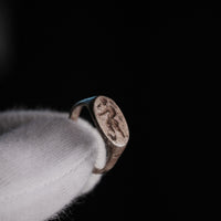 Side profile of Roman silver signet ring Faunus showing D-section hoop and sloping shoulders