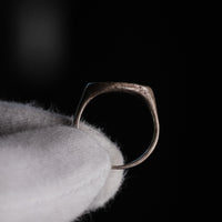 Roman silver ring Faunus viewed from above showing thin hoop and oval bezel construction