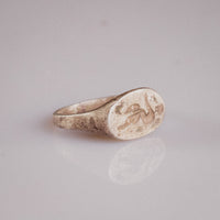 Reverse profile of Roman silver signet ring Faunus showing tapered band and shoulder transition
