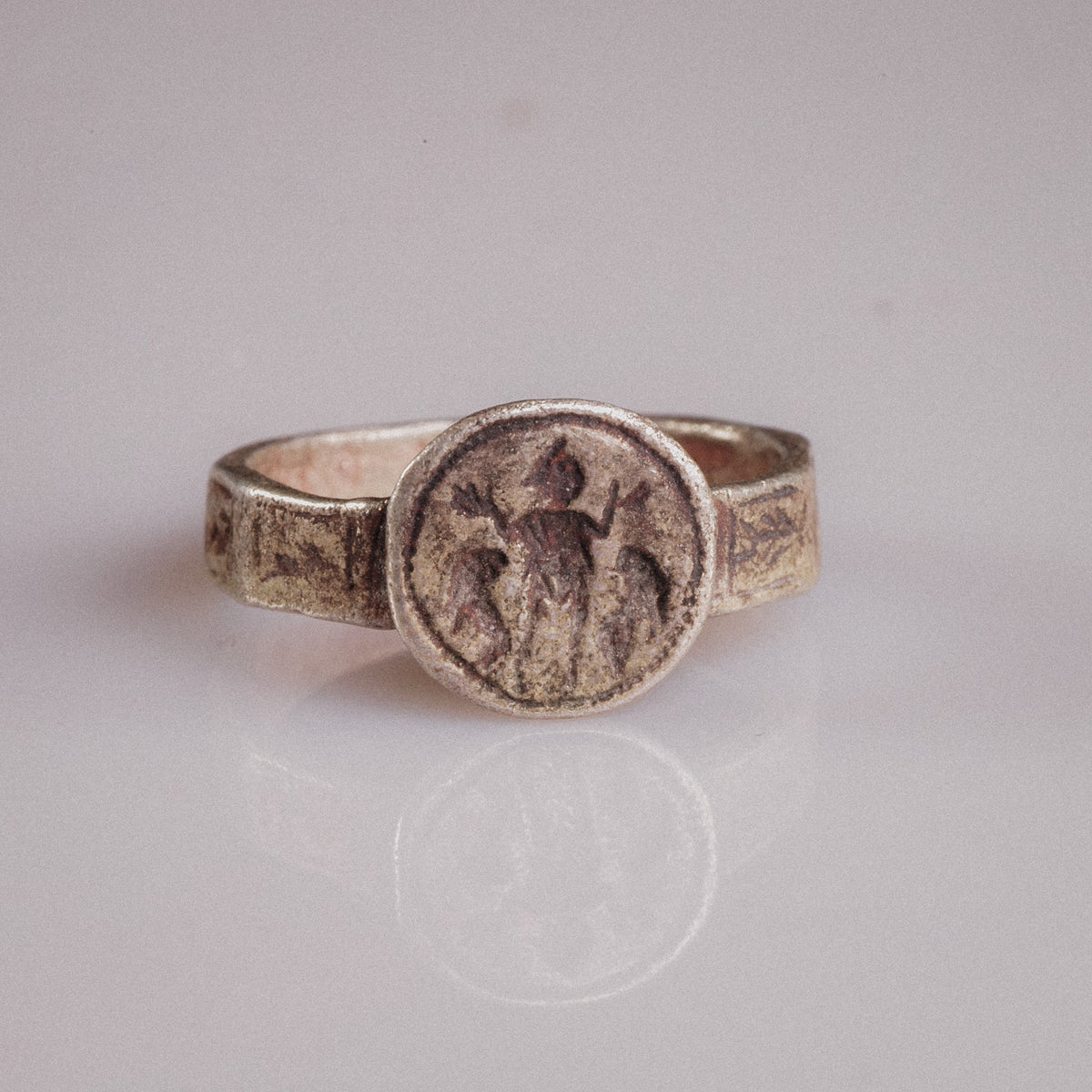 Front view of Byzantine silver ring Danielos with engraved Daniel in the Lions' Den scene