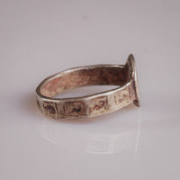 Side view of Byzantine ring Danielos with incised rectangular animal panels on band