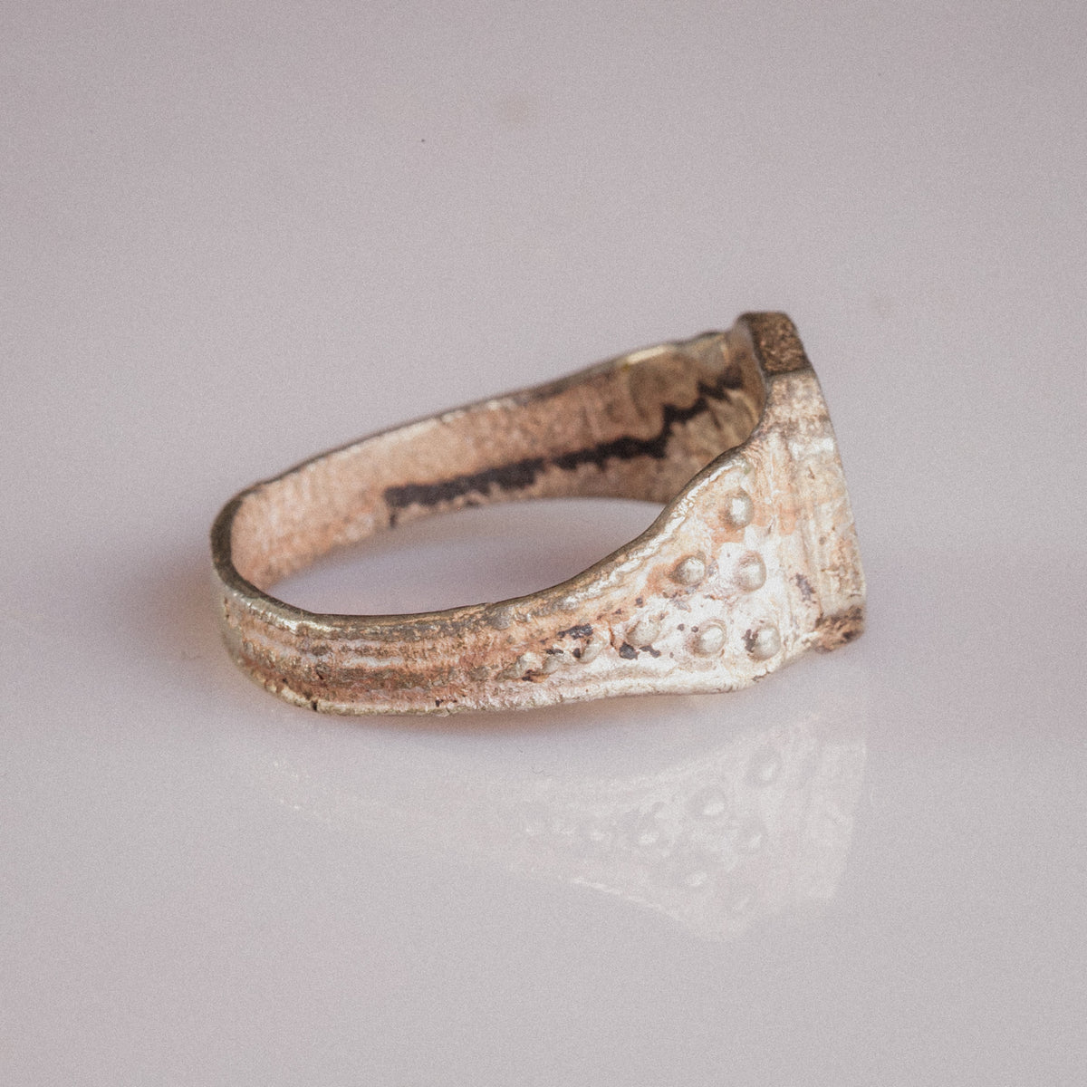 Back view of Vasilisa medieval silver ring showing granulated shoulder and horizontal hoop ribbing
