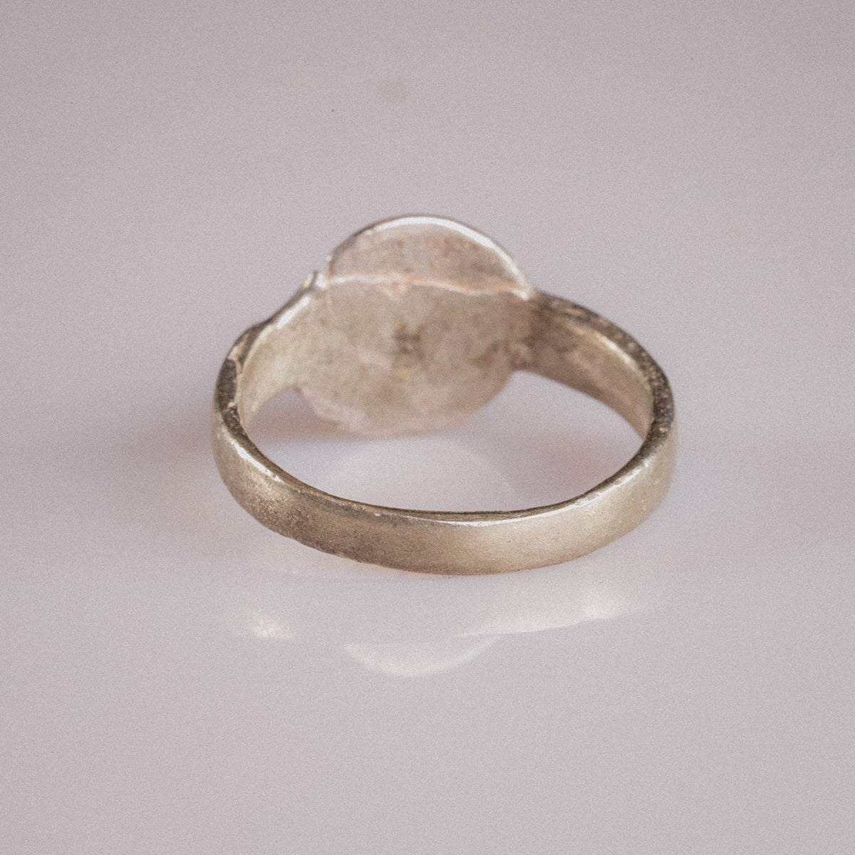 Three-quarter view of Lysenne medieval silver ring highlighting cast one-piece construction