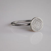 Byzantine silver ring Crucia front view showing herringbone spandrel engraving