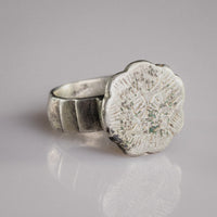 Side view of medieval silver ring Florian showing ribbed shoulder and raised bezel plate