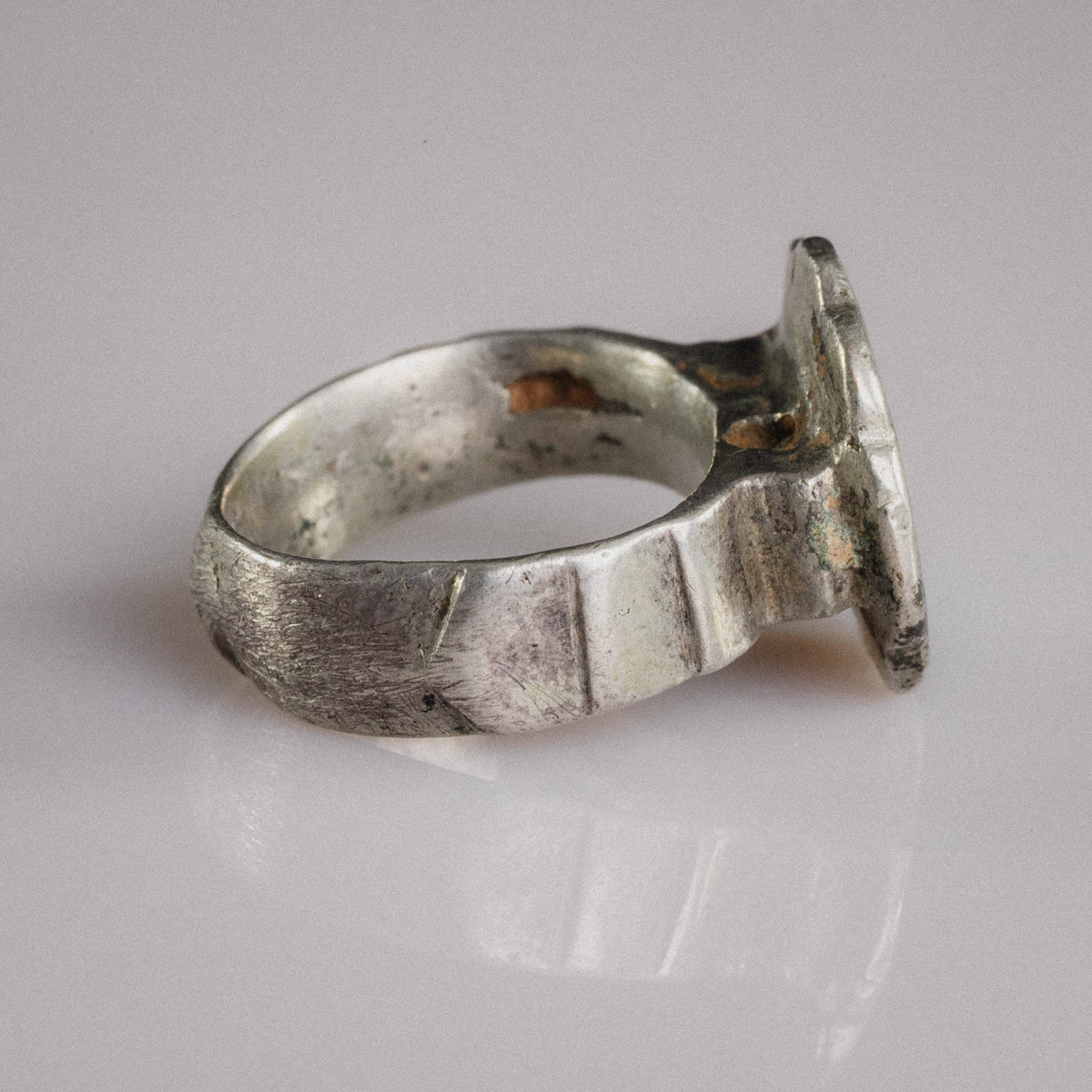 Profile of Florian medieval silver ring showing flat band and bezel construction