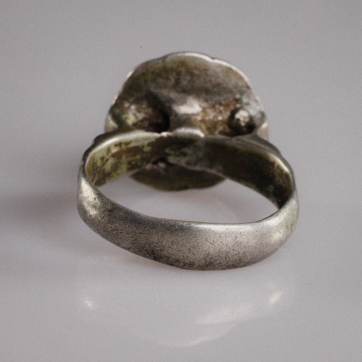 Rear view of medieval silver ring Stavros showing malachite-green corrosion inside the hoop