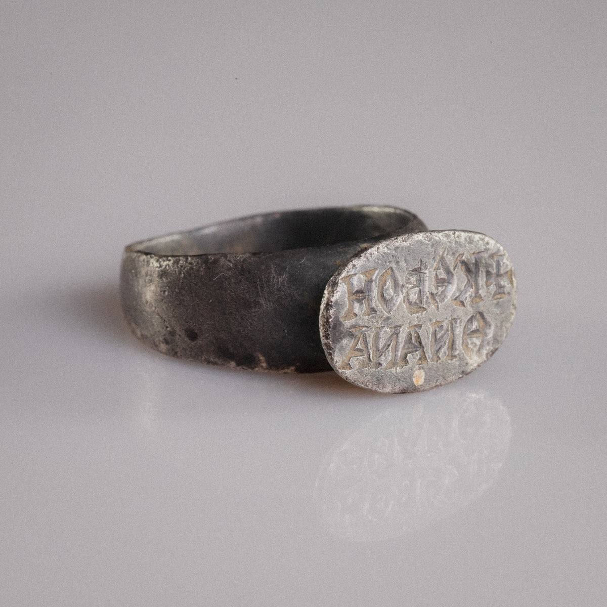 Byzantine silver signet ring Anna angled view of bezel and flared shoulders
