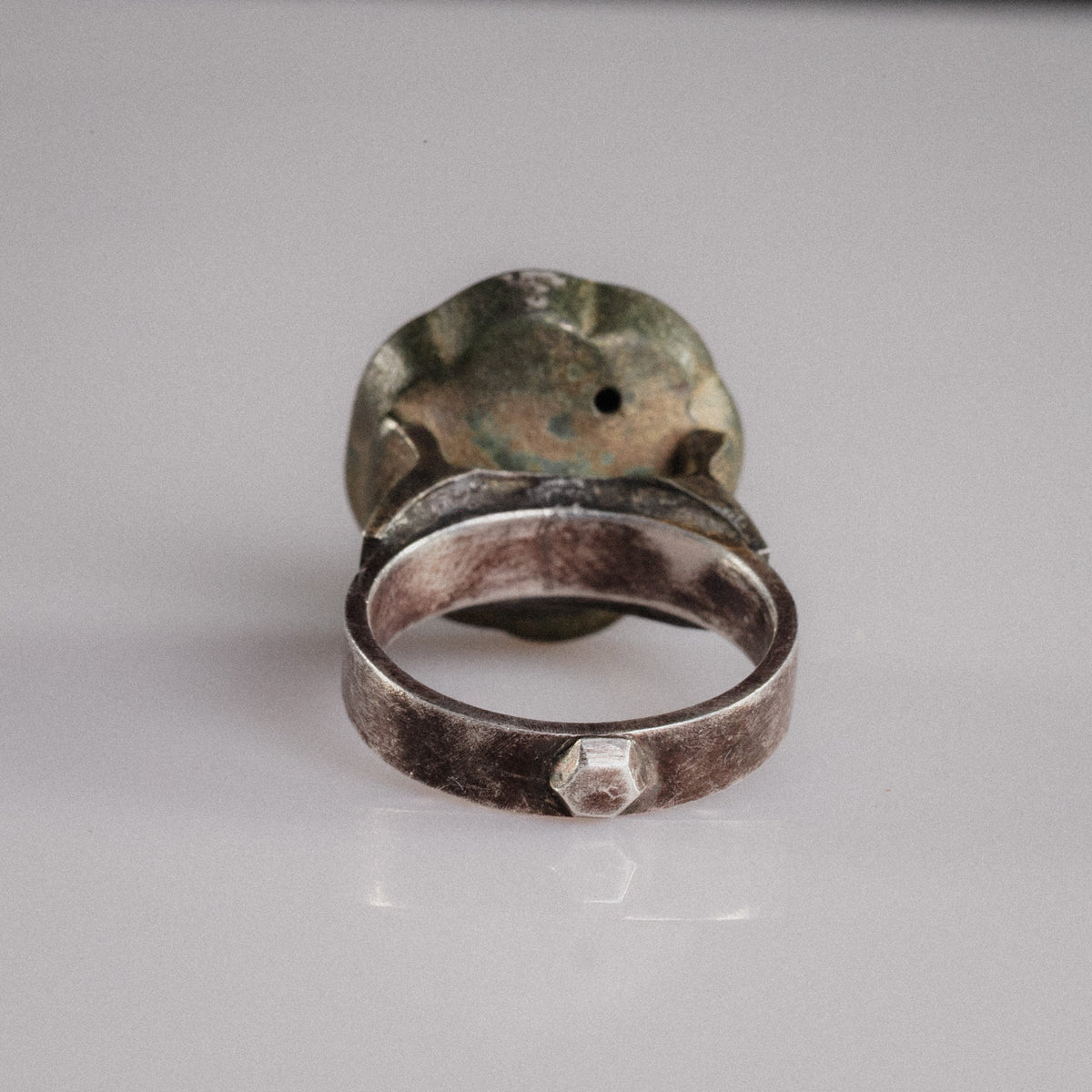 Rear view of Islamic silver ring Gulizar with faceted boss on the hoop