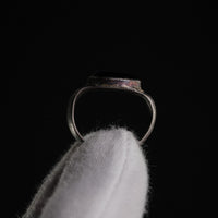 Profile of Roman silver ring Numerius Aquilus showing stone setting and collet edge