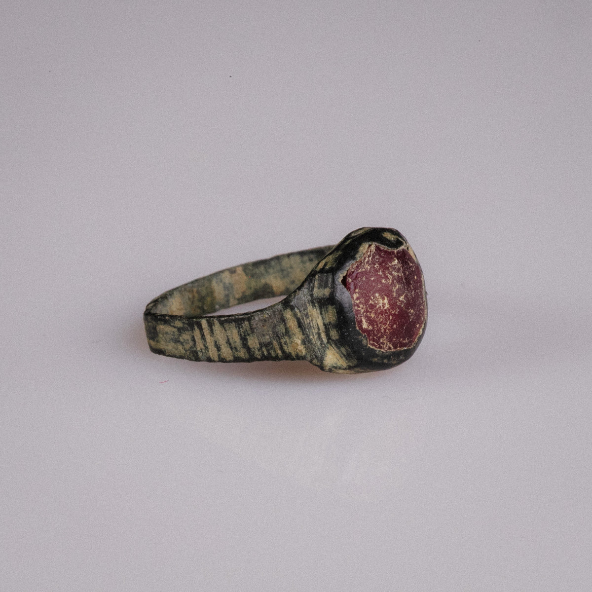 Medieval Bronze Ring with Red Glass Cabochon – 'Carminis' (9th–14th CE) — view 2