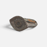 Roman bronze ring 'Catulla' shows its concentric bezel decoration from the opposite front angle.