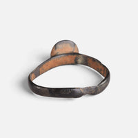 Byzantine bronze ring 'Georgios' shows the plain back of its round bezel and the inner hoop.