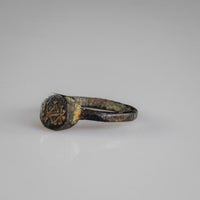 Angled view of Byzantine bronze ring Kyriakos highlighting octagonal bezel edges