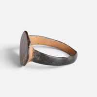 Byzantine bronze ring 'Okellina' shows its thin bezel edge and hoop from the opposite side.