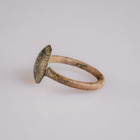 Angled view of Byzantine bronze ring Theodora highlighting bezel dome and hoop join