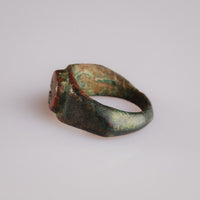 Angled view of Roman bronze ring Corvinus highlighting integral bezel construction