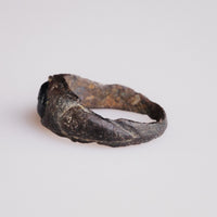 Back of Roman bronze ring Volusenus displaying tapered hoop and burial patina