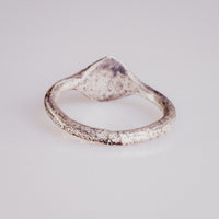 Back view of medieval silver signet ring Ruslan with even sulfide tarnish across the hoop