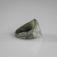 Back view of Roman bronze ring Leonis showing tapered hoop and green patina