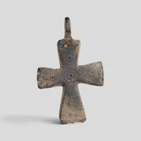 Byzantine bronze cross pendant Phanourios, obverse with five punched circle-and-dot stamps and flared arms