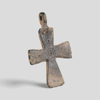 Byzantine bronze cross pendant Phanourios, three-quarter view showing suspension loop perforation