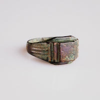 Byzantine bronze ring Aetheria, three-quarter view showing ribbed stepped shoulders and patina