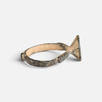 Byzantine bronze ring 'Damianos' shows its raised bezel edge and narrow hoop from the side.