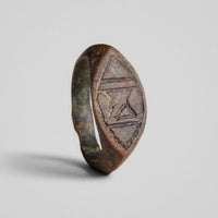 Byzantine bronze ring Doukas, oblique view of engraved bezel and angular shoulders