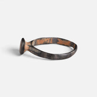 Byzantine bronze ring 'Georgios' shows its raised round bezel edge from the opposite side.