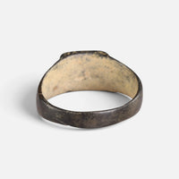 Byzantine bronze ring 'Ioanna' shows its plain inner bezel and broad hoop from behind.