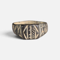 Byzantine bronze ring 'Ioanna' shows geometric and angular linework across the front of its broad band.