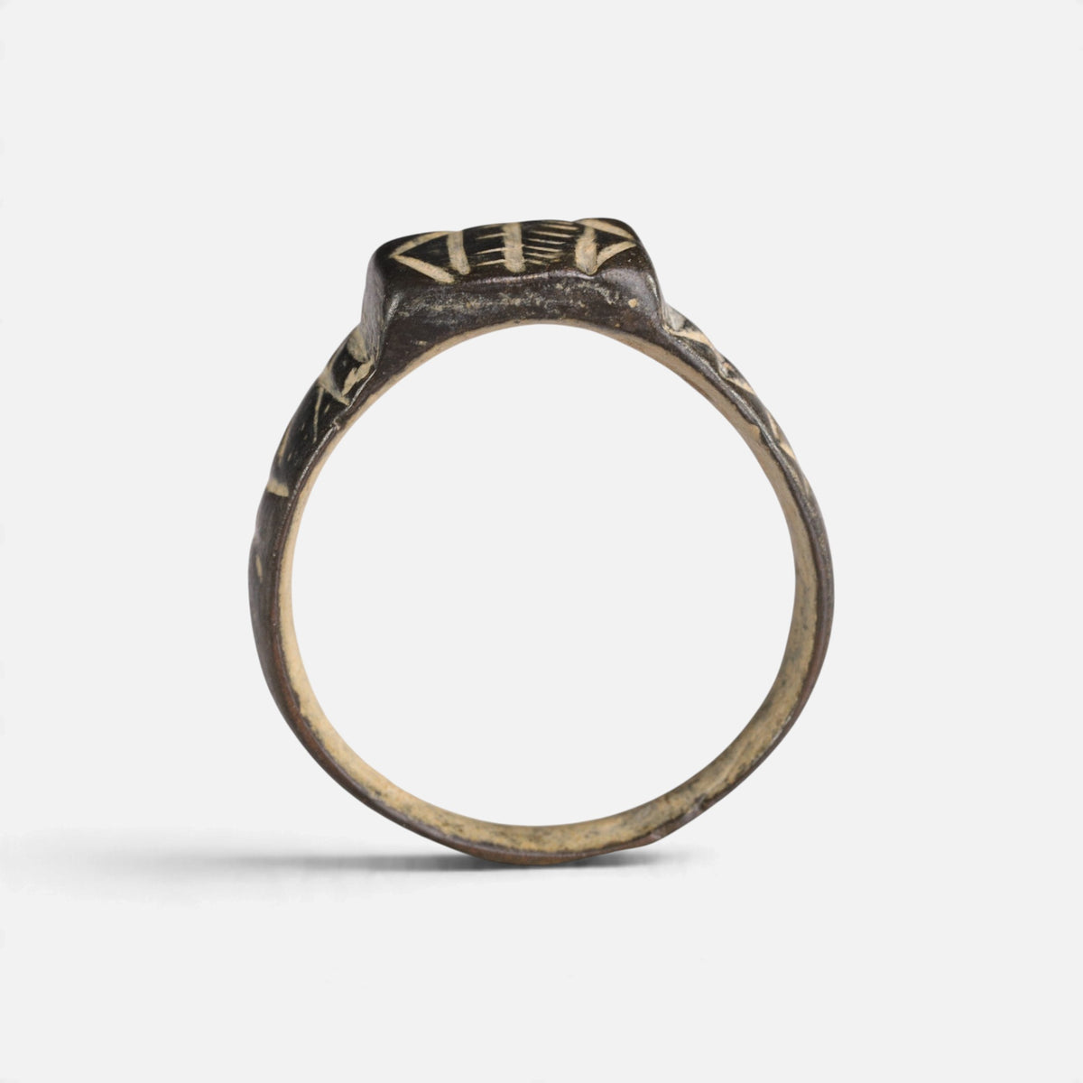 Byzantine bronze ring 'Ioanna' shows its complete hoop and the squared bezel edge in profile.
