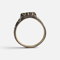 Byzantine bronze ring 'Ioanna' shows its complete hoop and the squared bezel edge in profile.